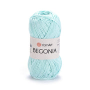 A skein of YarnArt Begonia yarn in a light minty aqua blue color, wrapped with a white paper label, on a clean white background.
